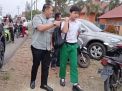 Bupati Merangin H. M. Syukur Antar Anak ke Sekolah